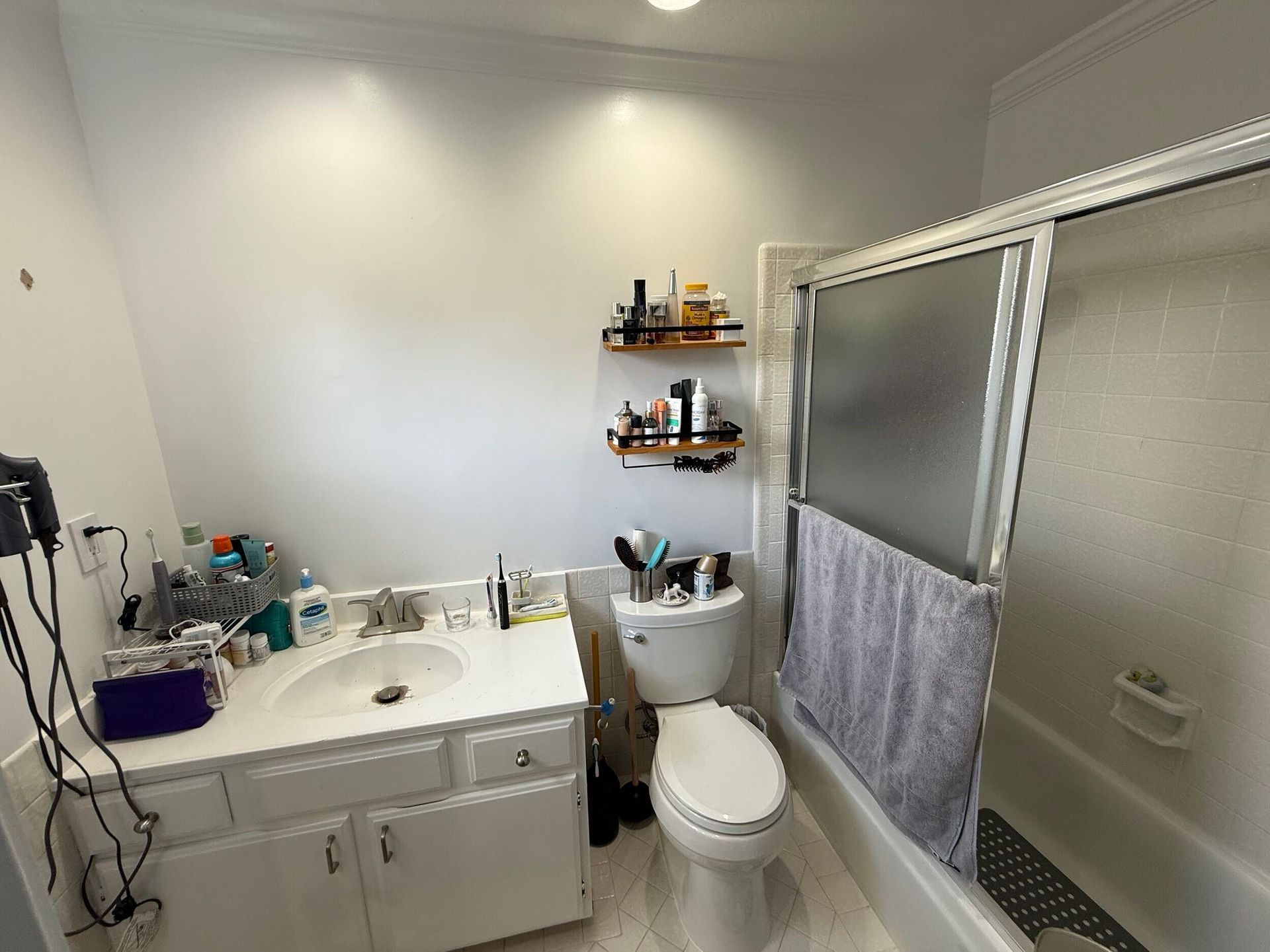 Complete bathroom renovation transforming an outdated bathtub into a spacious, modern walk-in shower with frameless glass enclosure, custom navy blue subway tile, decorative shower niche, brushed brass fixtures, rainfall showerhead, handheld shower system, built-in shower bench, grab bars for accessibility, and premium porcelain tile flooring. The remodel also features a custom navy shaker vanity with quartz countertop, integrated LED medicine cabinet, modern undermount sink, upgraded lighting, comfort-height smart toilet, and contemporary plumbing fixtures.
This bathroom remodel was designed to improve functionality, accessibility, storage, durability, and everyday comfort while adding lasting value to the home. Dream Build Services specializes in custom bathroom renovations using high-quality materials and craftsmanship tailored to each homeowner's style and needs.
Services Included:
• Bathroom Remodeling
• Bathroom Renovation
• Tub-to-Shower Conversion
• Walk-In Shower Installation
• Custom Tile Installation
• Frameless Glass Shower
• Quartz Countertop Installation
• Custom Vanity Installation
• LED Medicine Cabinet Installation
• Accessibility Bathroom Upgrades
• Plumbing Fixture Replacement
• Home Remodeling
• General Contractor Services