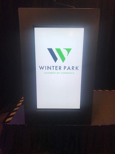 A sign that says winter park on it