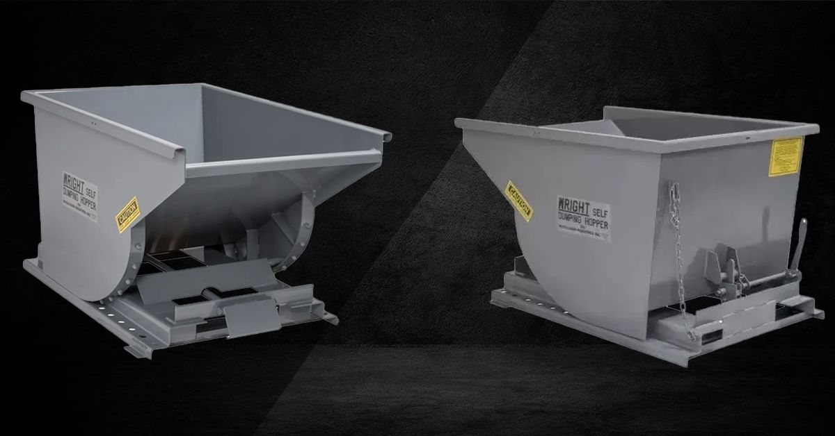 Two gray industrial self-dumping hoppers against a dark background.