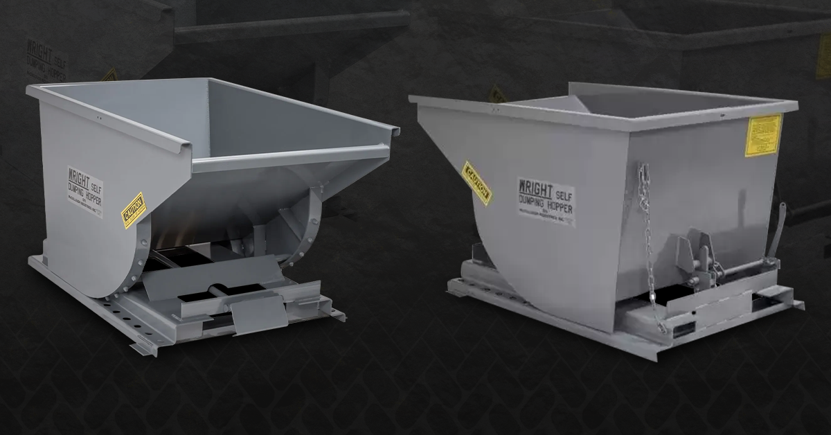 Two gray industrial hoppers on a dark surface, angled at the bottom for material dispensing.