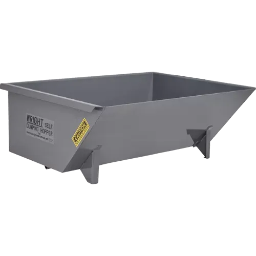 Gray metal self-dumping hopper bin, tilted slightly, with a yellow hazard warning sticker.