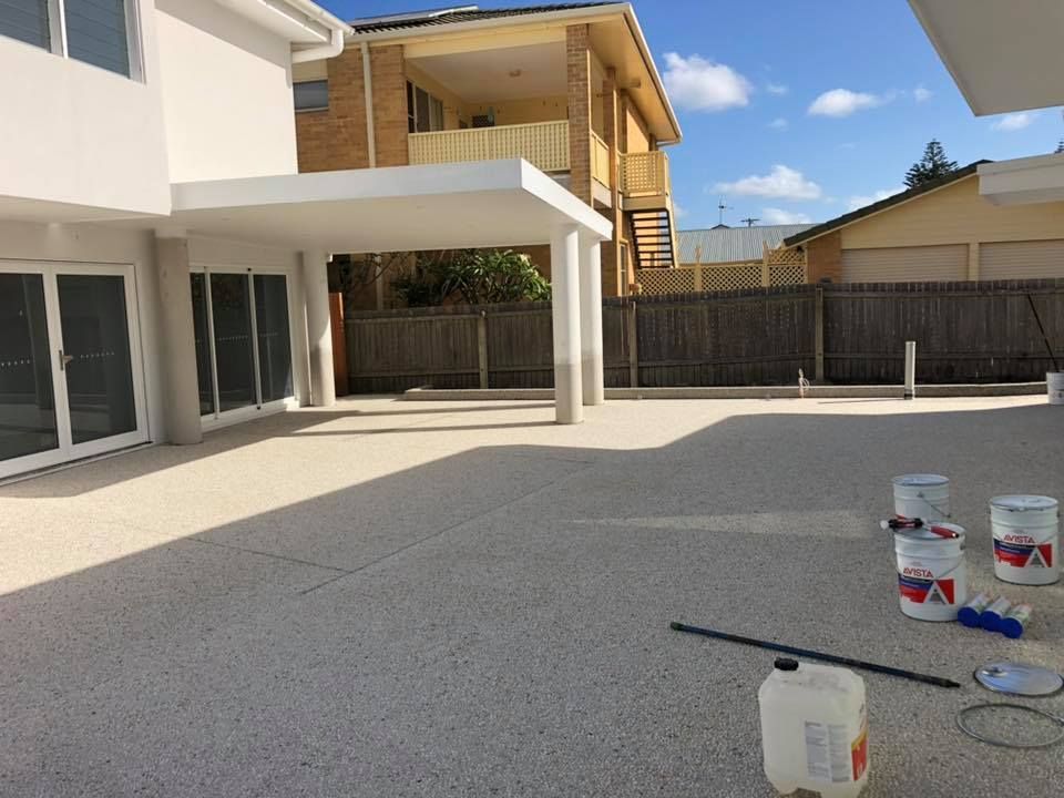 A Large House With A Lot Of Windows Is Being Painted — Luke Seears Concreting in Port Macquarie, NSW