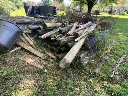 wood, trash, building material waste in yard, construction debris cleanup wilmington de