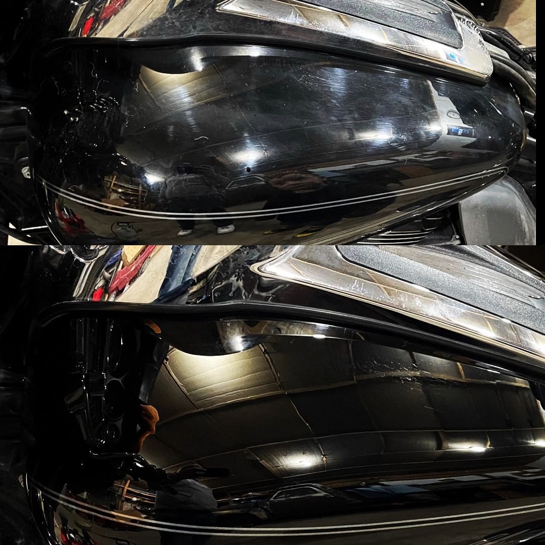 Two motorcycle tanks are stacked on top of each other