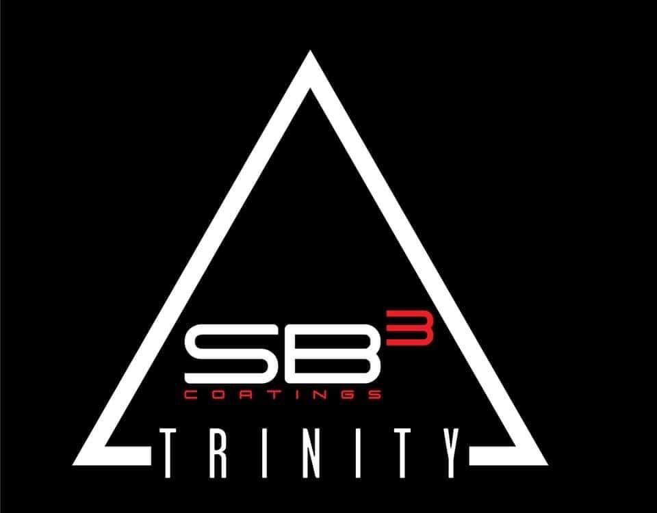 A logo for sb3 coatings trinity on a black background