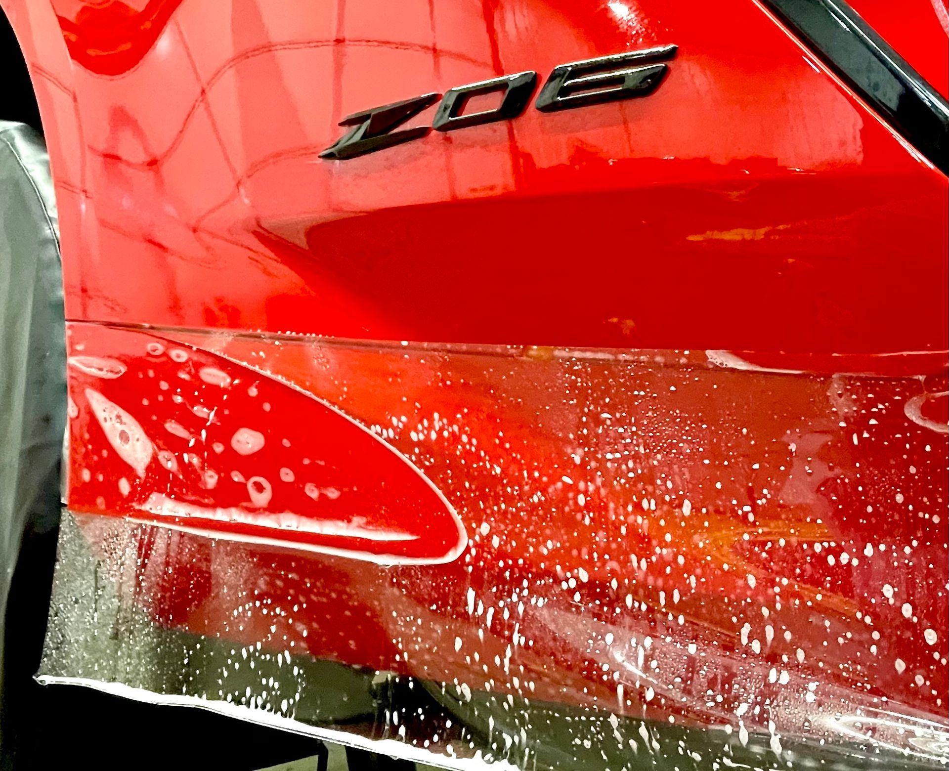 A red car with the word zoe on it