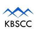 Blue mountain peaks above the black text “KBSCC” on a white background