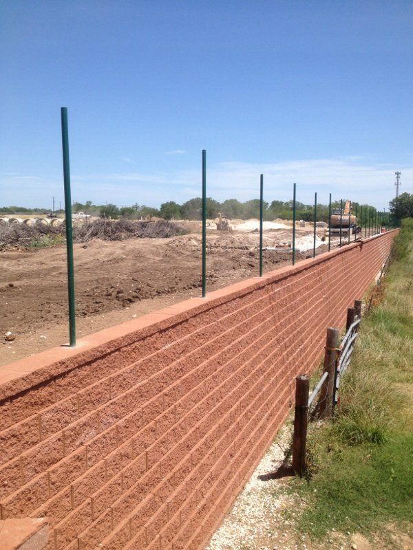 A retaining wall in Comfort, TX by Border Construction Services