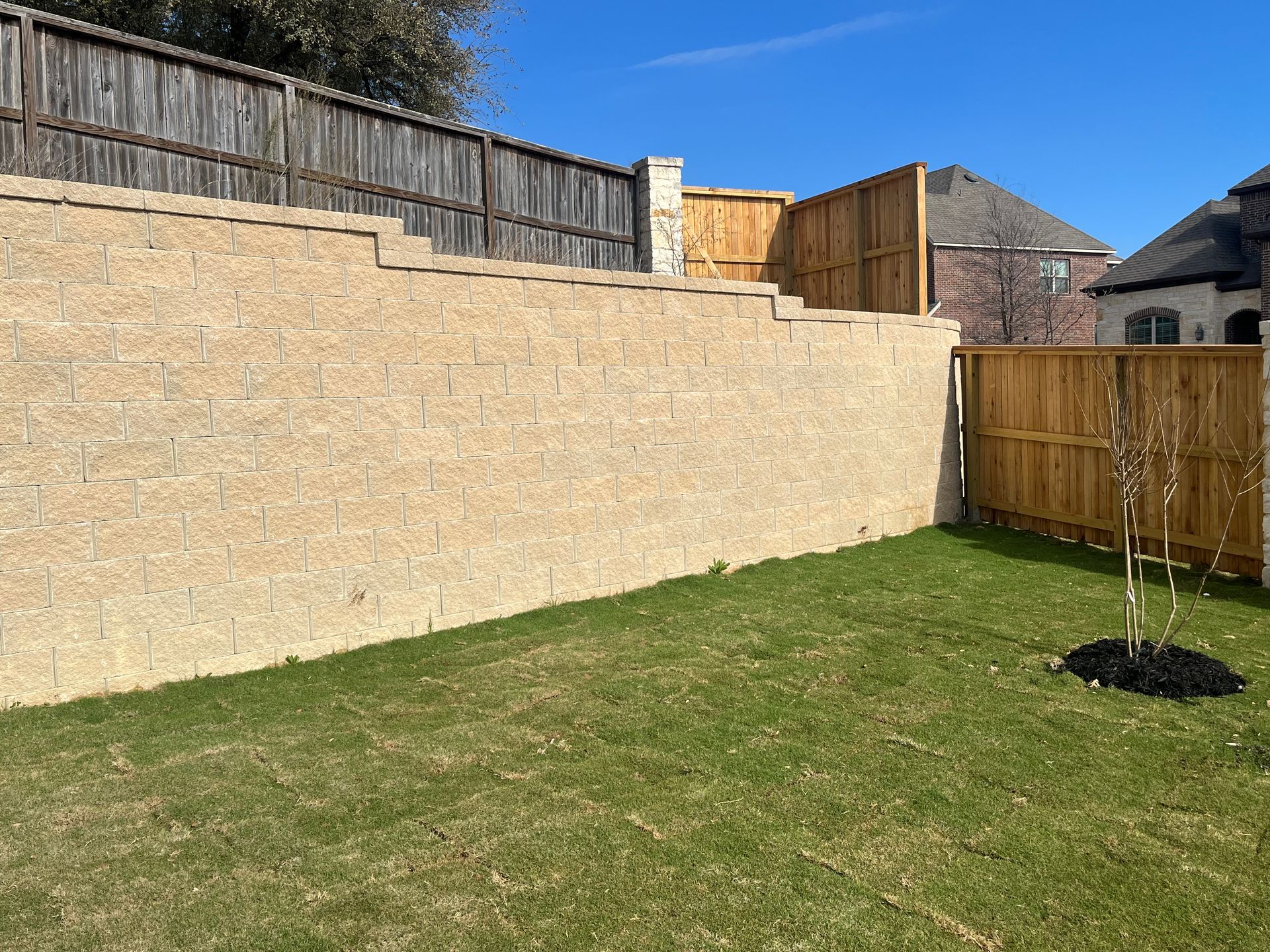 A retaining wall in San Antonio, TX by Border Construction Services