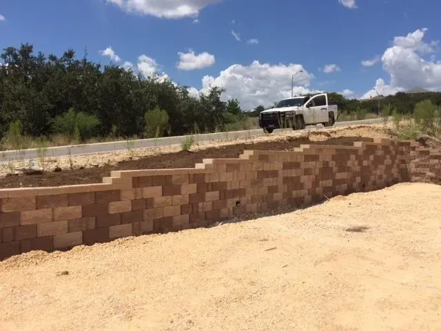 A retaining wall in Kerrville, TX by Border Construction Services