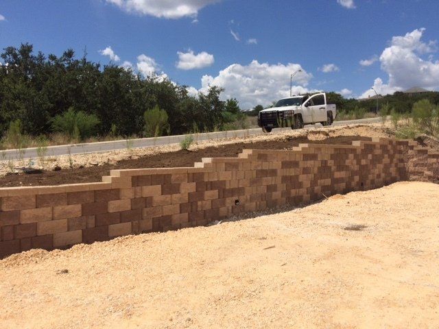 A retaining wall in San Antonio, TX by Border Construction Services