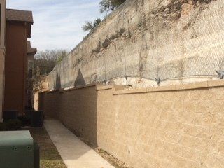 A retaining wall in Comfort, TX by Border Construction Services