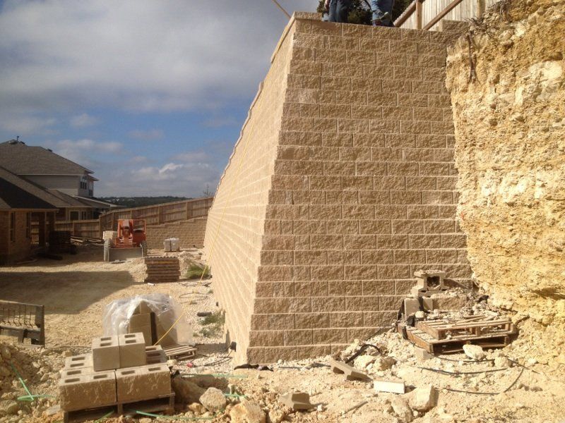 A retaining wall in Kerrville, TX by Border Construction Services