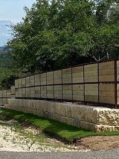 A retaining wall in Comfort, TX by Border Construction Services