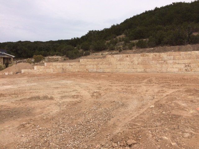 A retaining wall in Comfort, TX by Border Construction Services