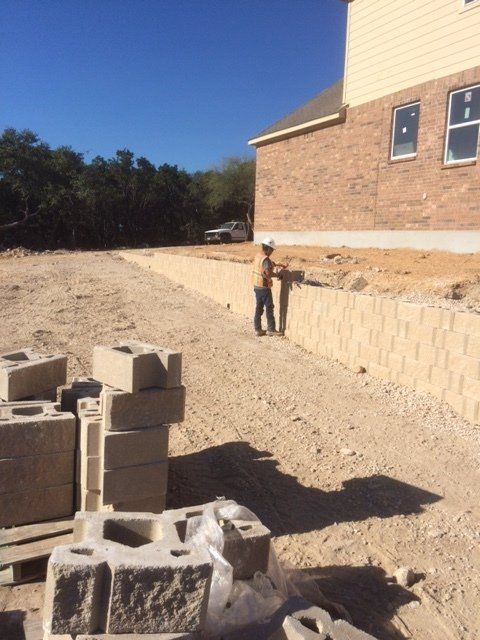 A retaining wall in Comfort, TX by Border Construction Services