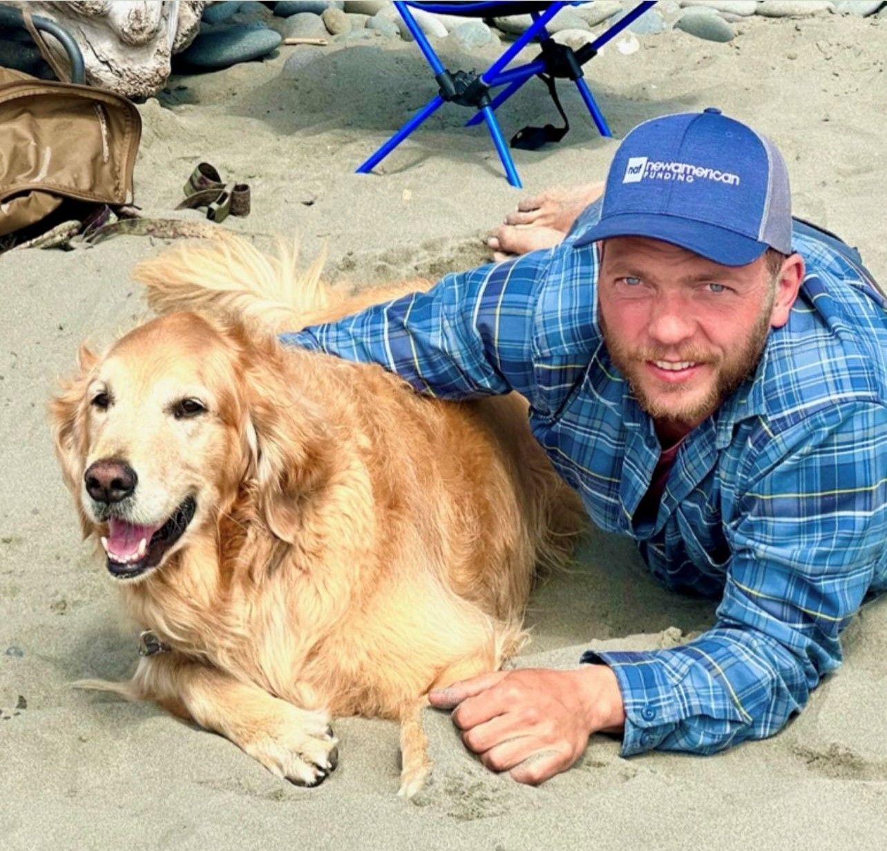 Nick jeatran and with his dog Bud
