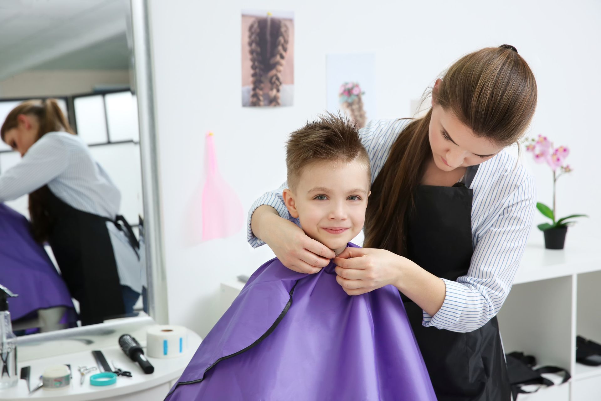 Kid getting hair cut