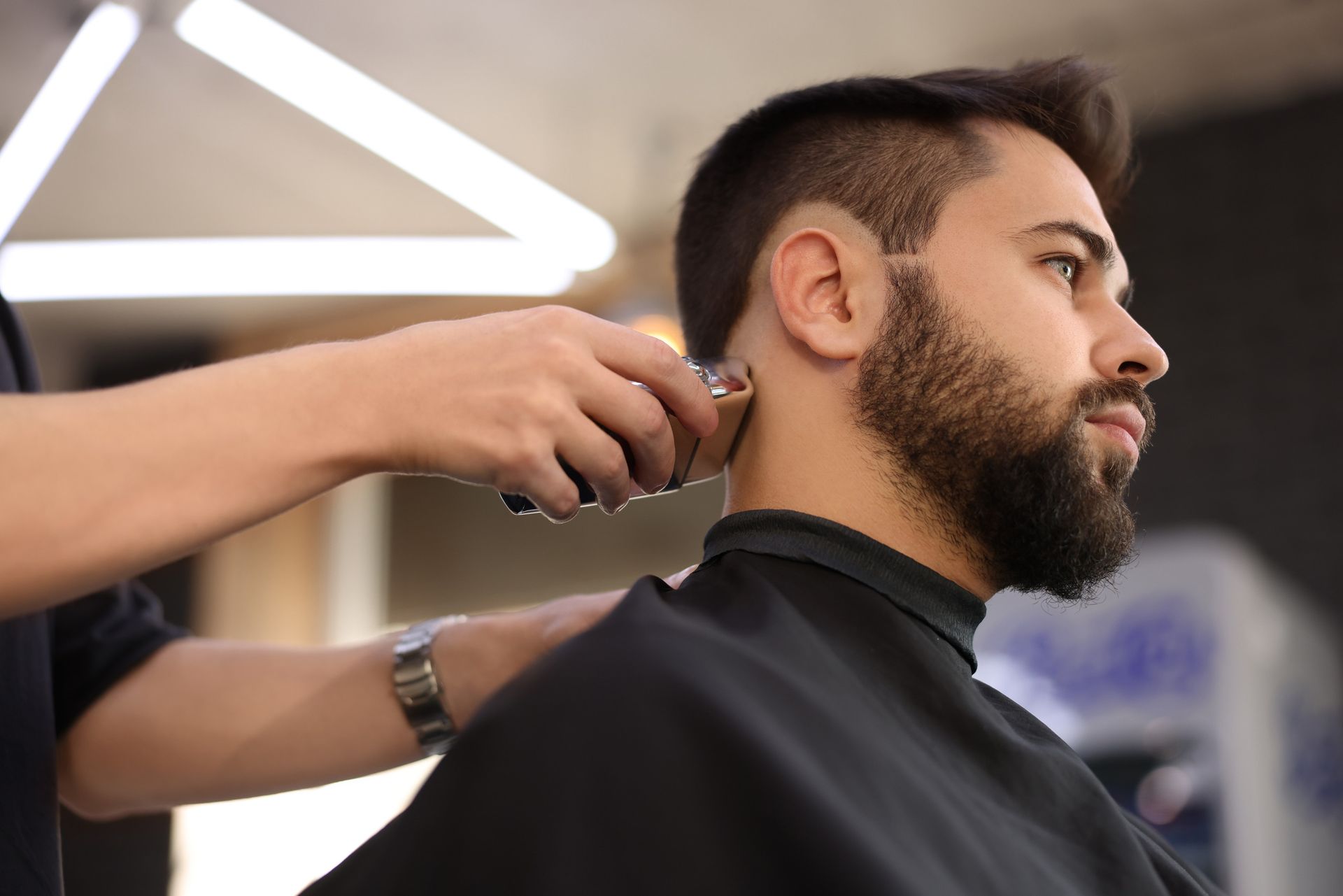 Guy getting hair cut