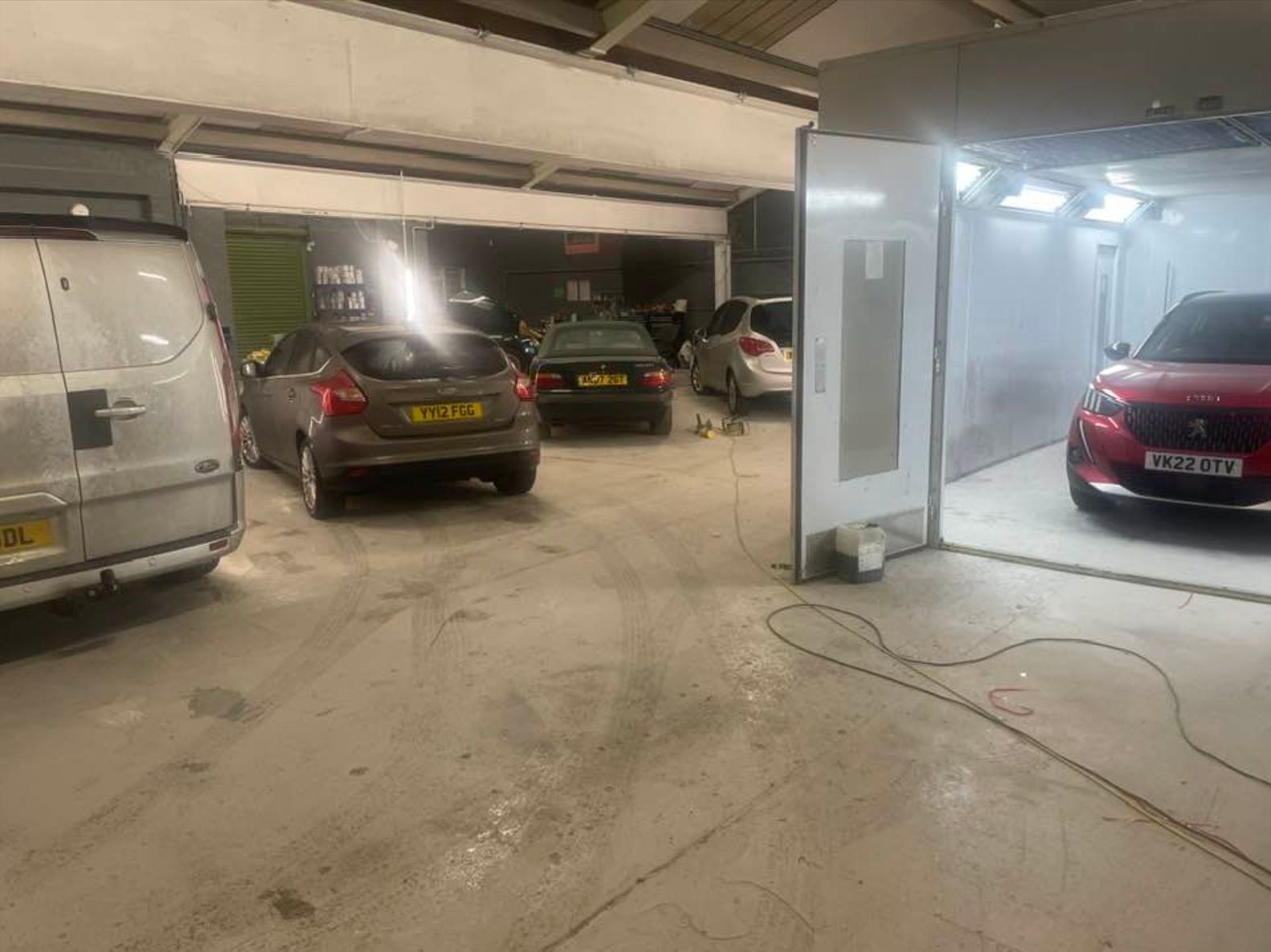 scratch repair company - inside repair shop and paint booth