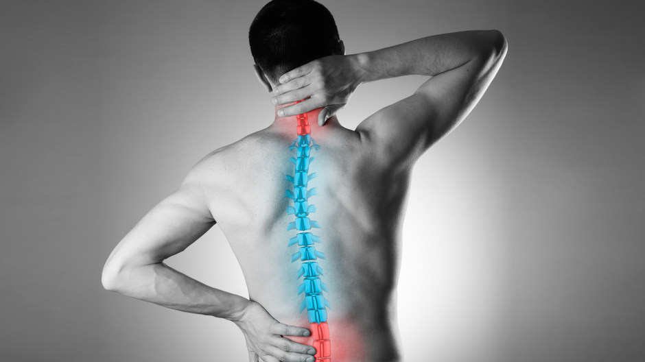 Back view of person holding neck and lower back, with glowing blue and red spine pain highlight