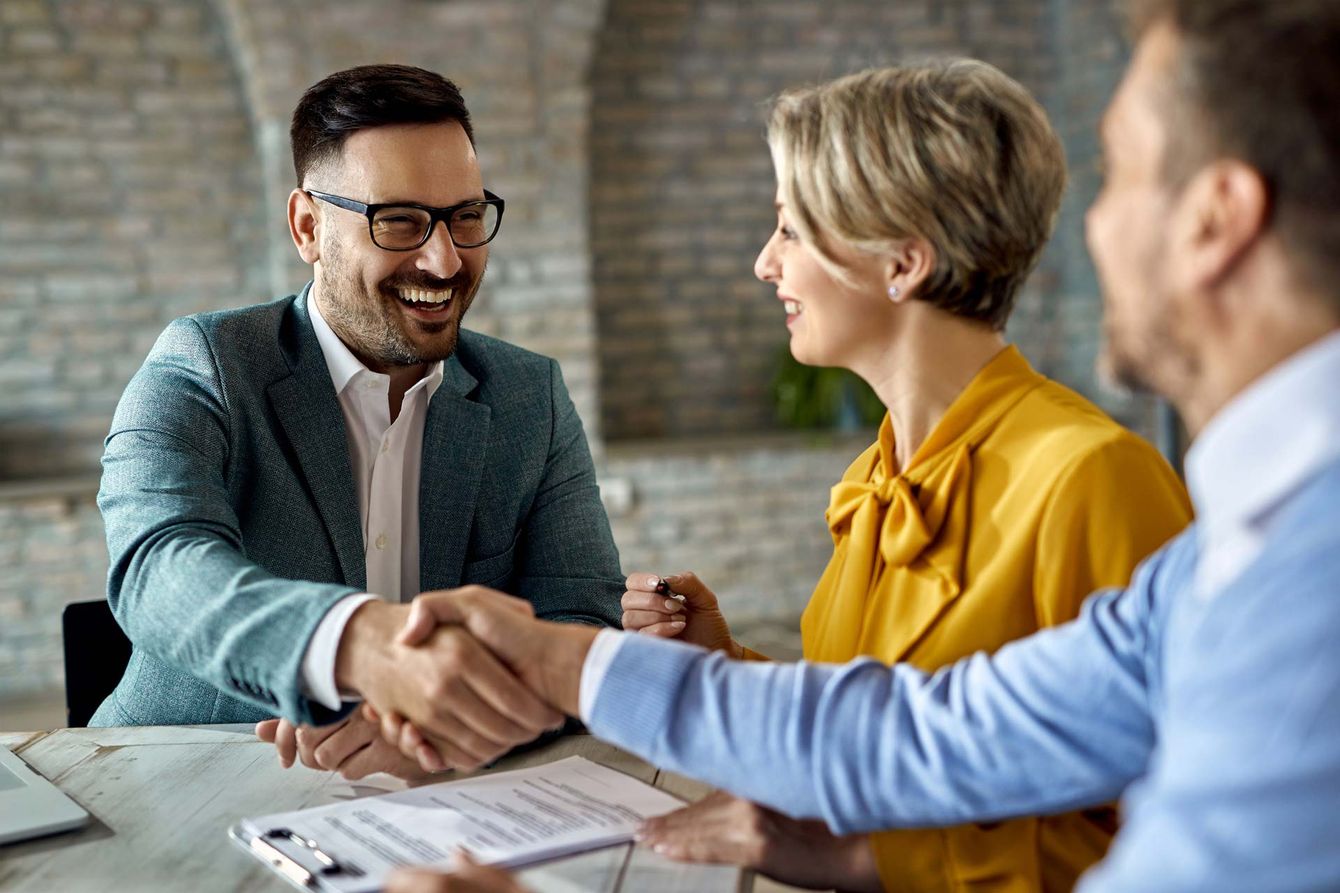 Insurance Agent with Couple Client