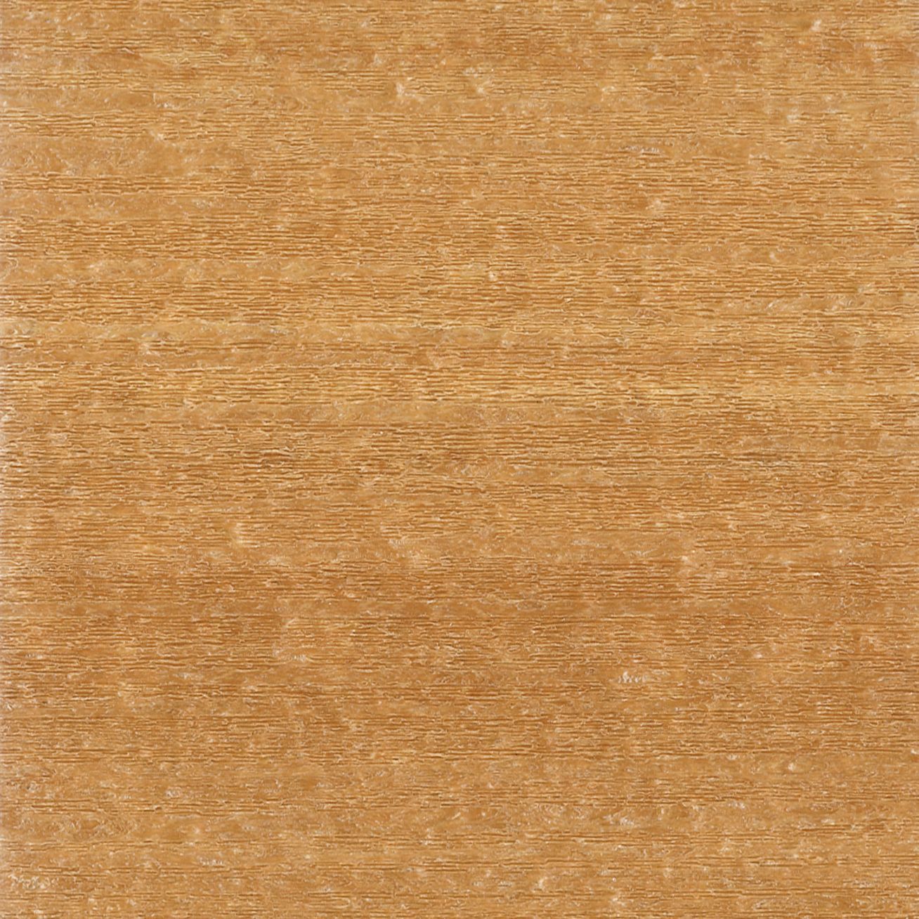 Close-up of a light brown wood grain surface