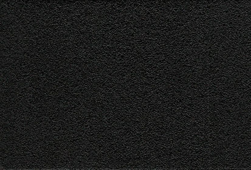Dark static noise texture with speckled gray and black grain