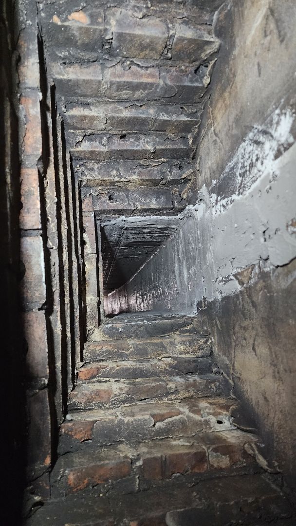 A row of stairs leading up to the top of a building.