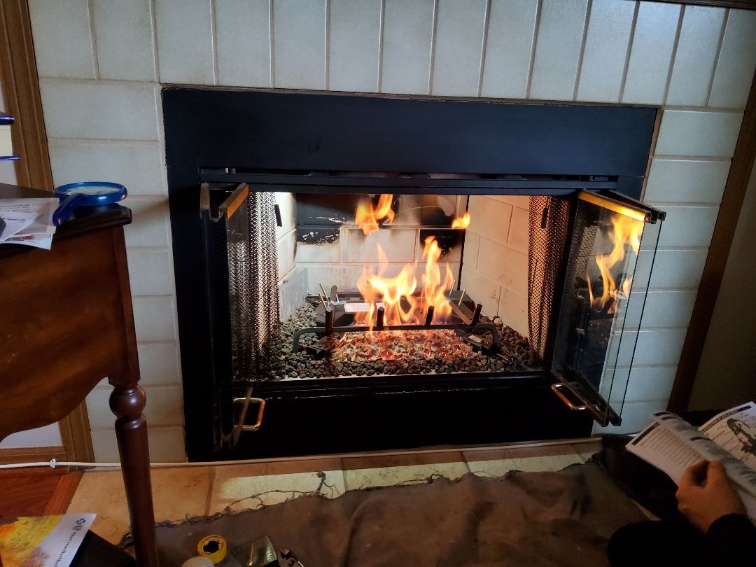 A fireplace with flames coming out of it