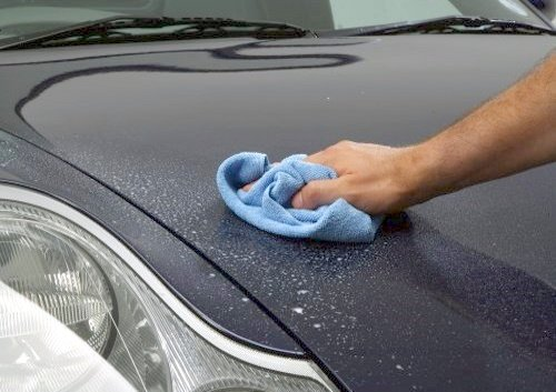 Professional hand cleaning car detailing service