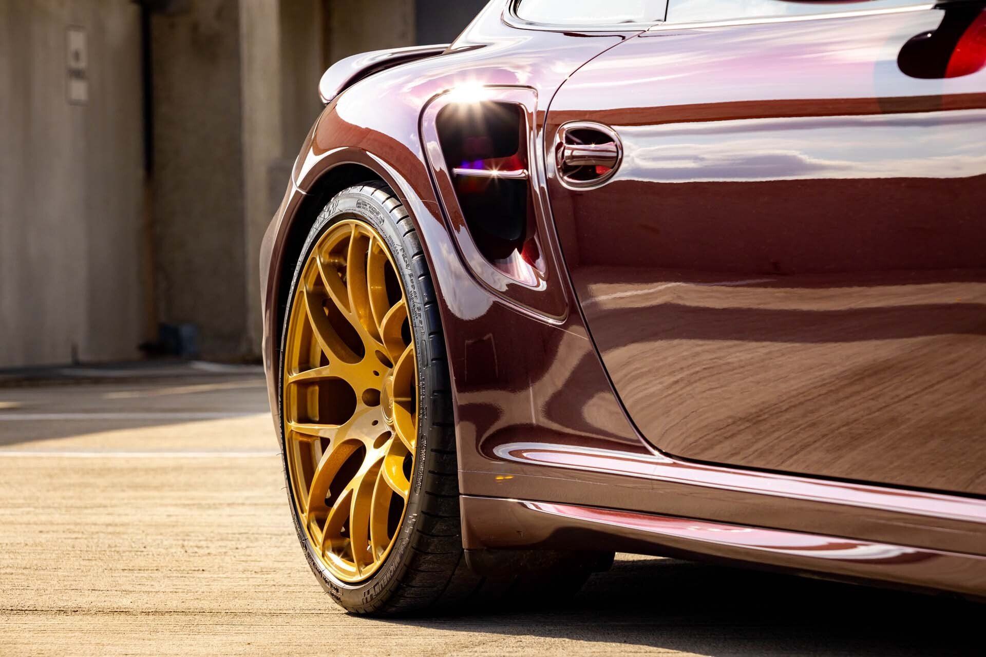 front of a porsche