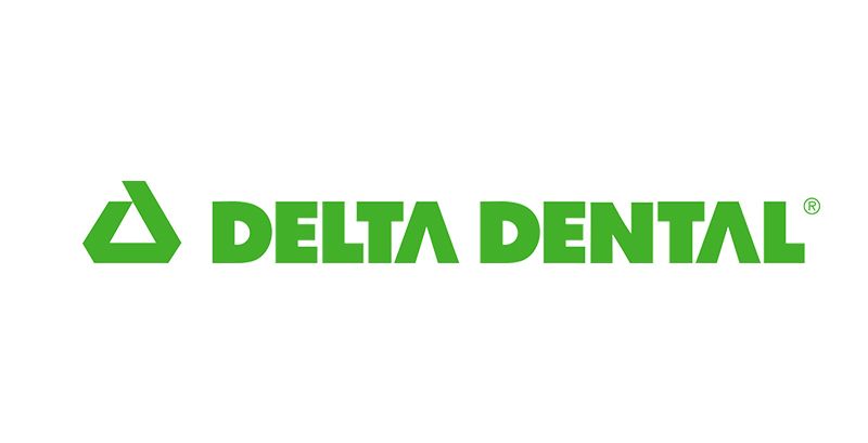 The delta dental logo is green and white on a white background.