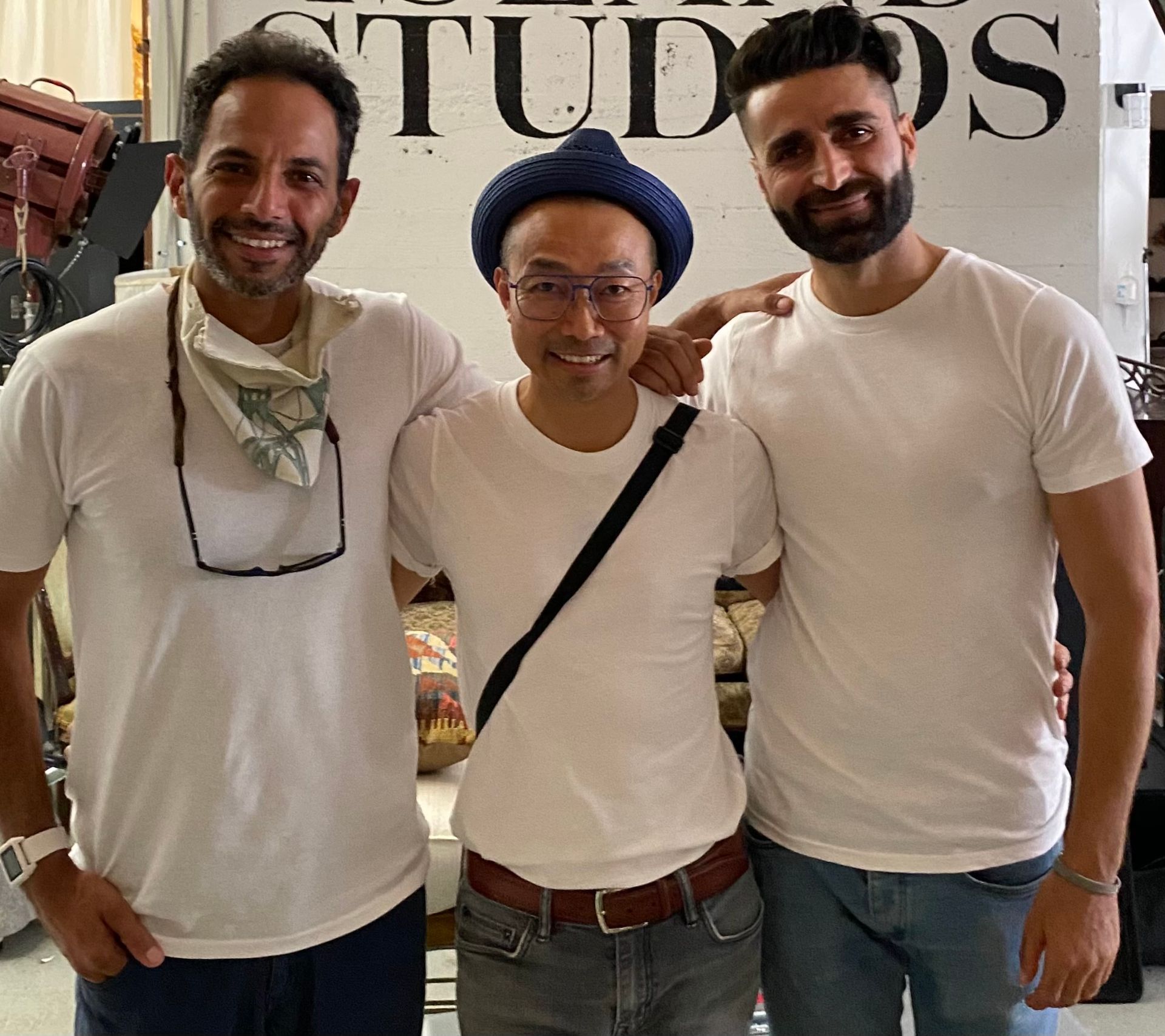 three handsome men in white t shirts modeling the benefits of Ishq skincare & haircare