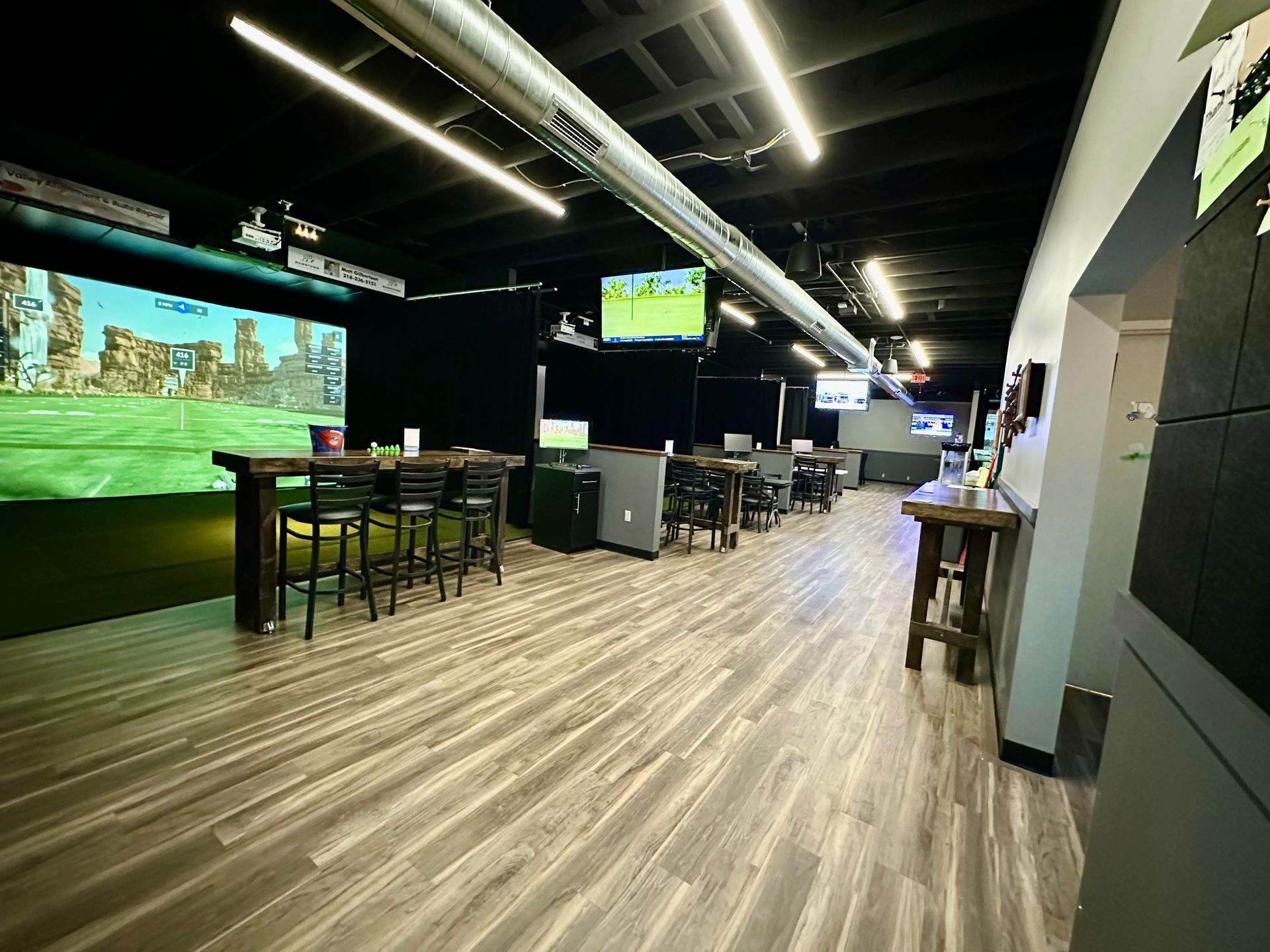 Empty Bay Area — Moorhead, MN — The Clubhouse Indoor Golf Lounge Empty Bay Area — Moorhead, MN — The Clubhouse Indoor Golf Lounge