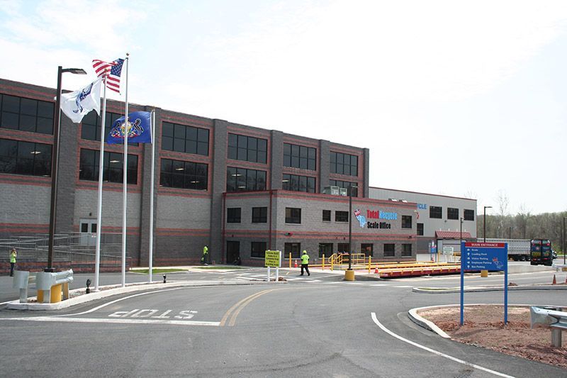 Photograph of the TotalRecycle facility from the entrance parking lot