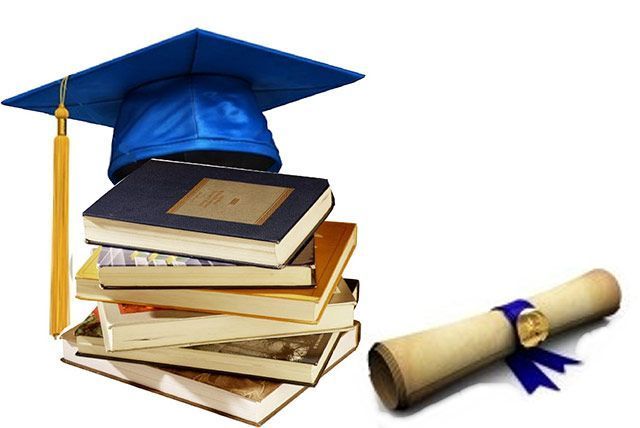 Graduation cap atop a stack of books beside a rolled diploma tied with a blue ribbon