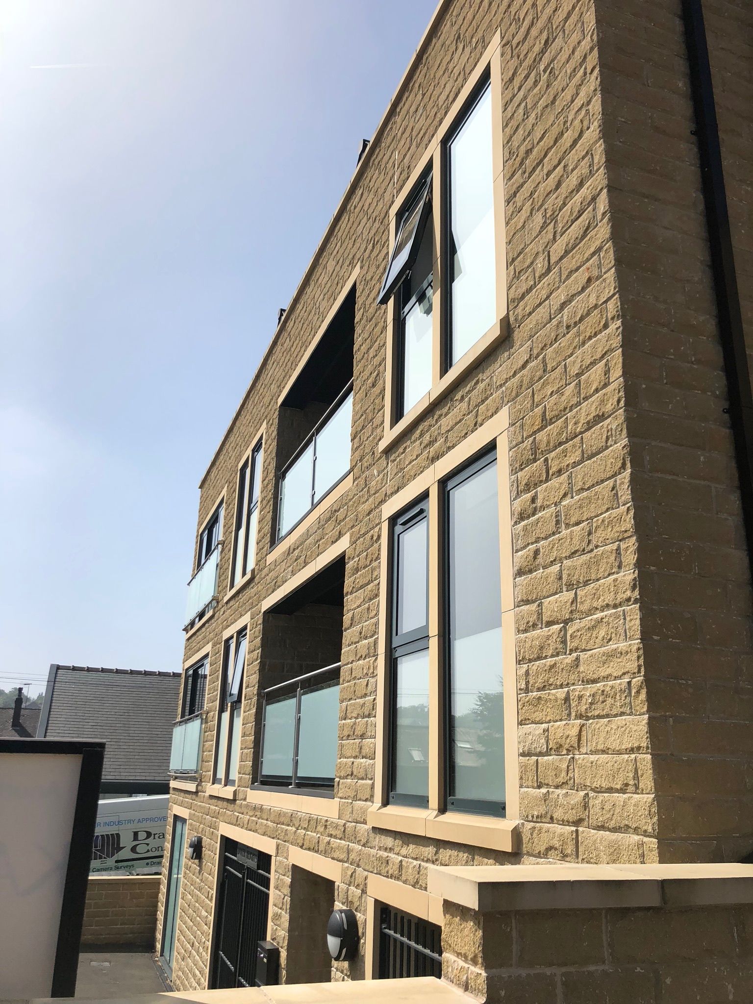 A large brick building with a lot of windows