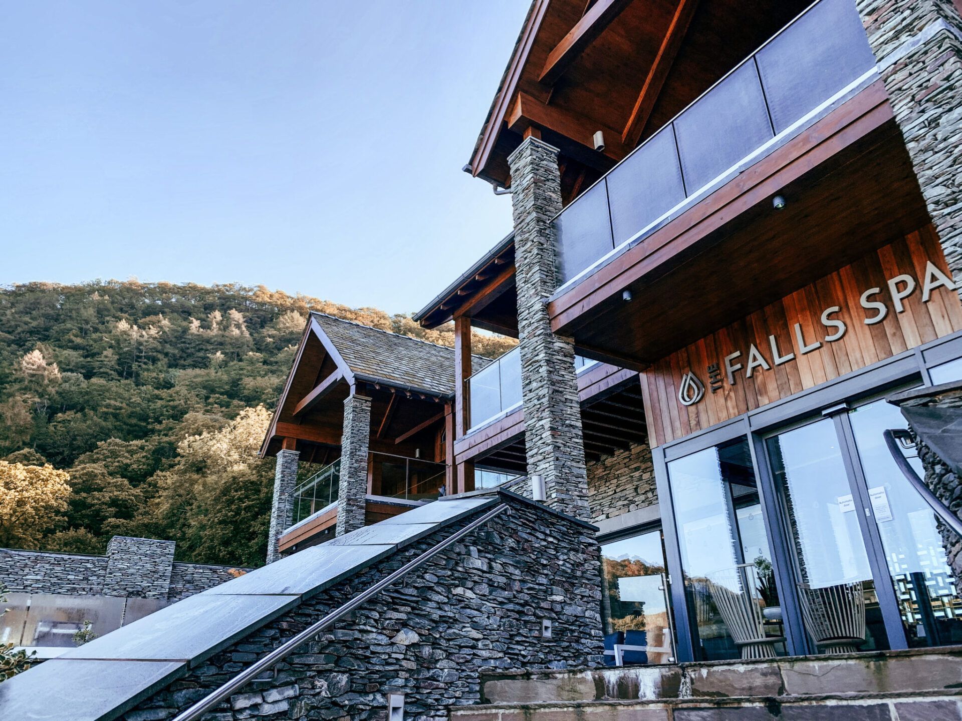 A large building with stairs leading up to it is called falls spa.