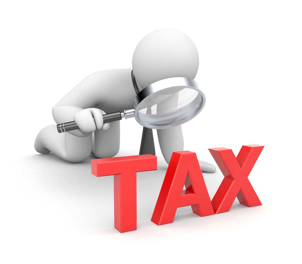 A 3d man is looking through a magnifying glass at the word tax