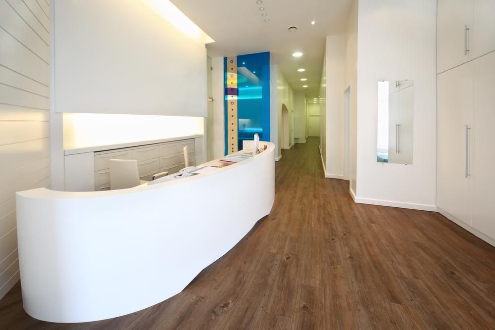 A Long Hallway With A White Counter In The Middle — Mall Medical Centre In Alice Springs, NT