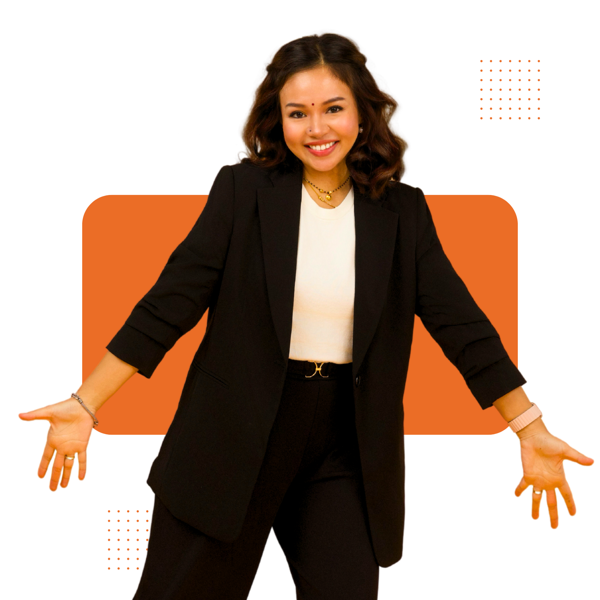 A woman in a suit is standing in front of an orange sign.