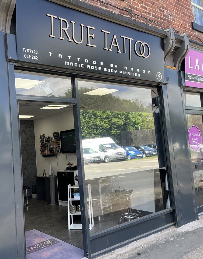 Exterior of a tattoo parlor, 