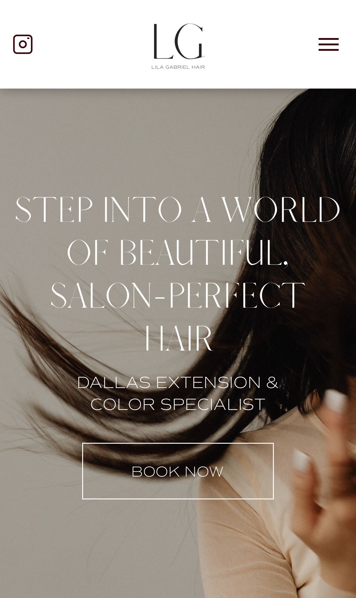 A woman 's hair is blowing in the wind on a website.