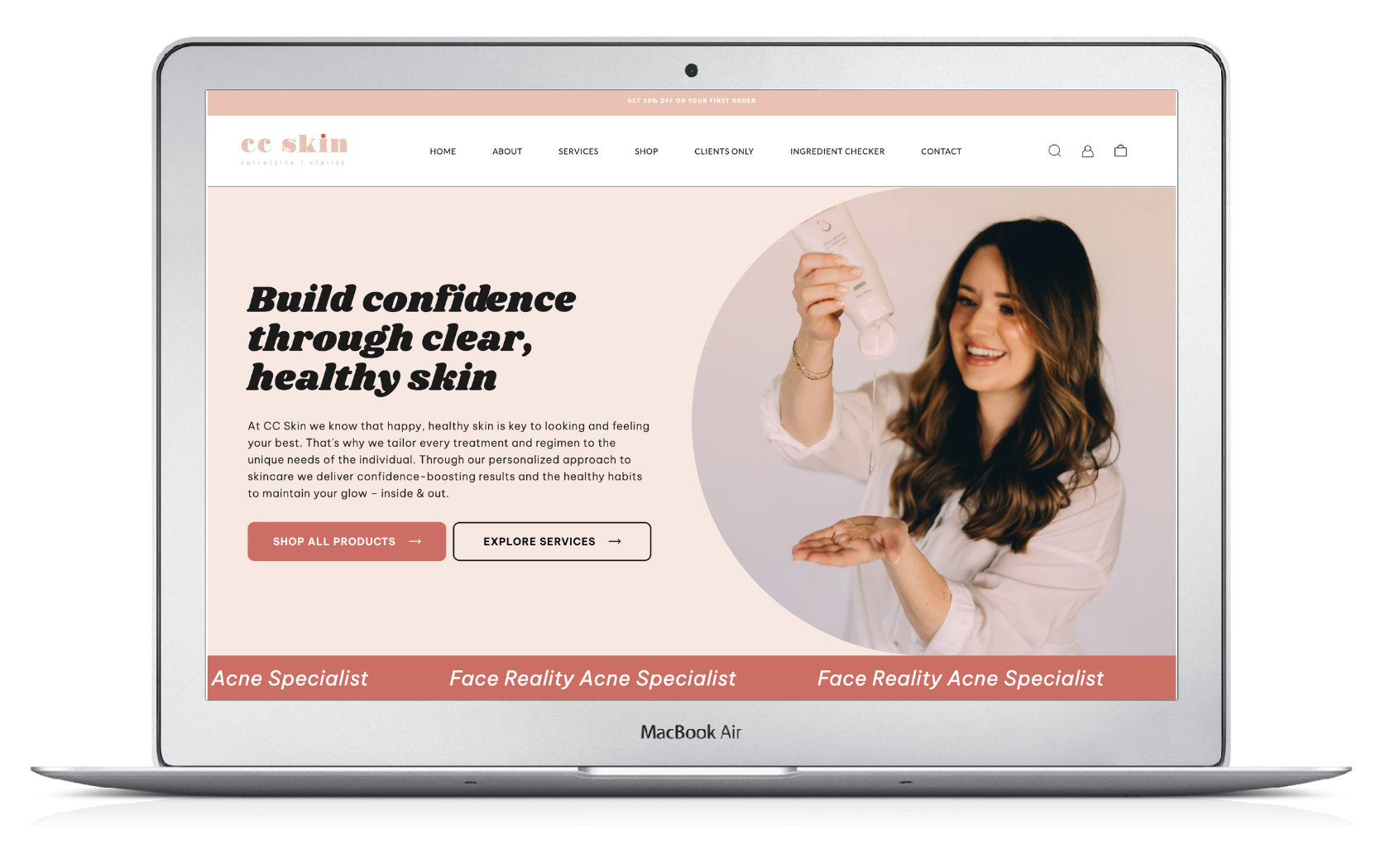 A laptop computer is open to a website with a woman on it.