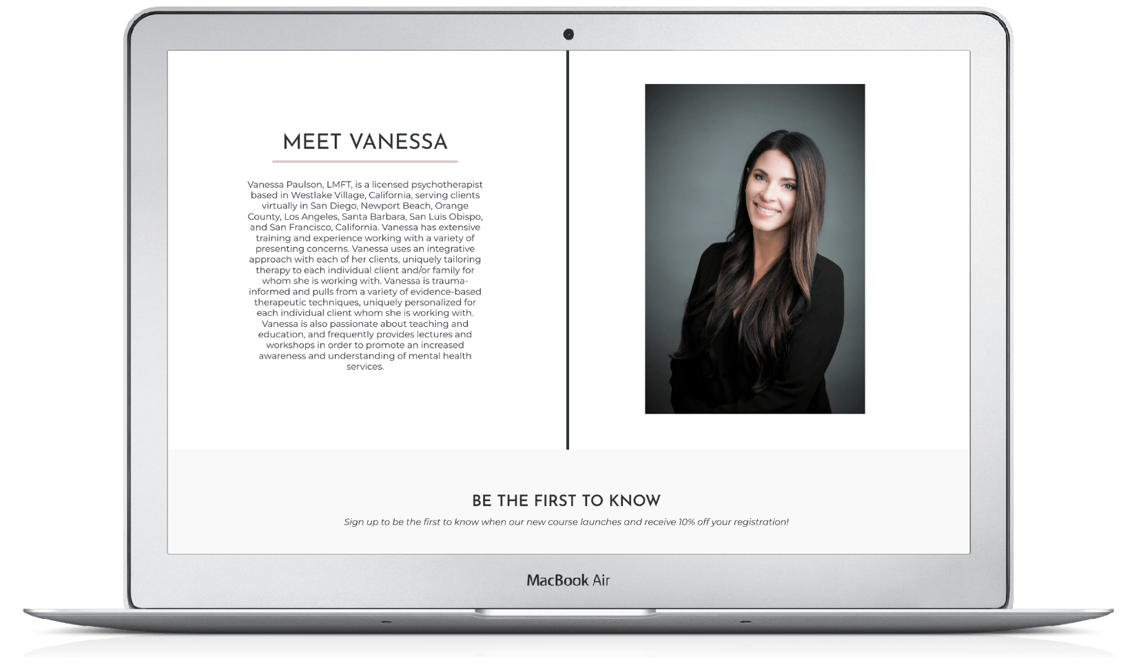 A laptop computer with a picture of a woman on the screen.