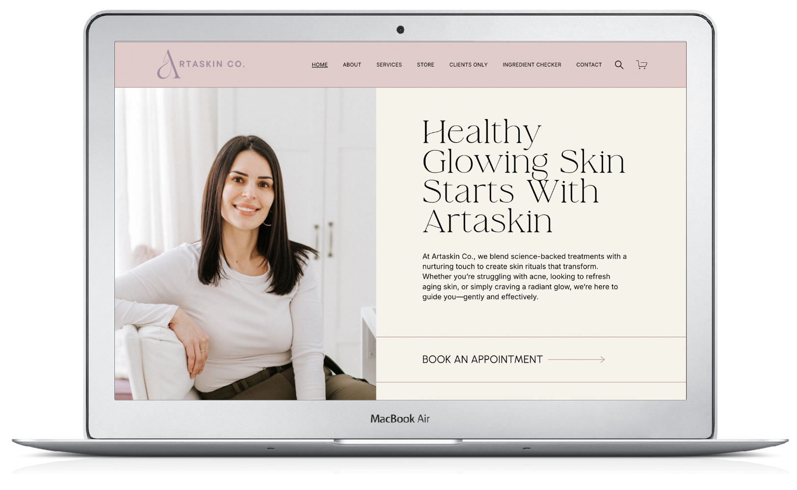 Laptop screen displays Artaskin website with a woman smiling, text 