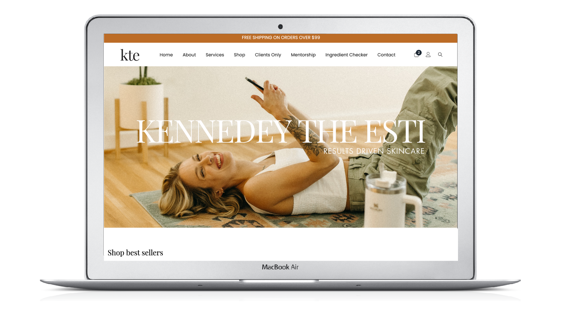 Website mockup: woman lying down, smiling, using phone, text 