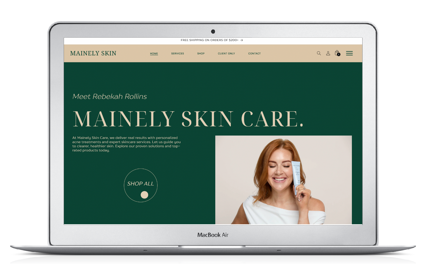 Laptop displaying a skincare website homepage. Woman in a sweater covers face. 