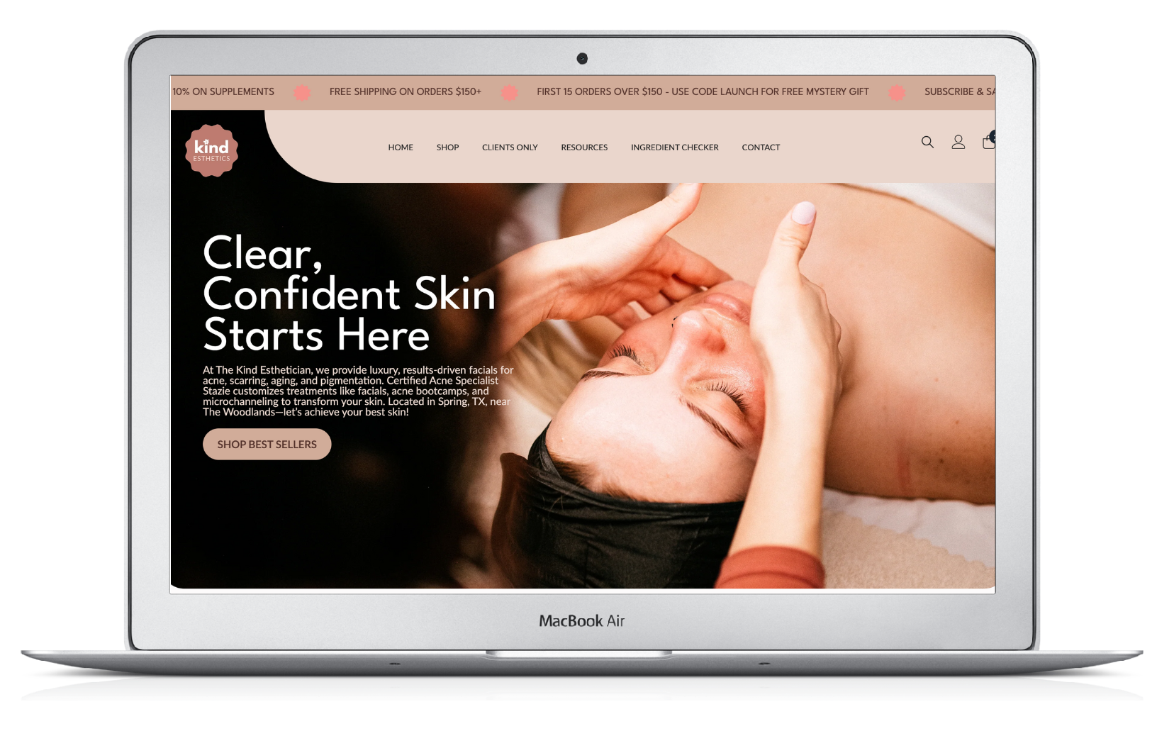 Laptop displaying a skincare website with the headline “Clear, Confident Skin Starts Here” and a face massage image